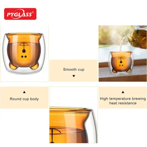 Double wall glass cup shaped like a bear with smooth and round body, designed for high temperature brewing. Tea being poured into it.