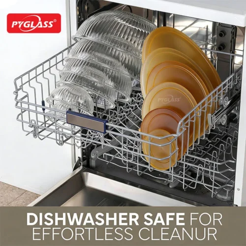 Open dishwasher loaded with Pyglass plates and bowls, with text highlighting the dishwasher-safe feature for easier cleaning.