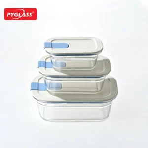 Three stackable glass food storage containers with airtight plastic lids featuring blue locking mechanisms.